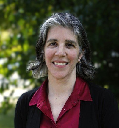 Photo of Julie Wittmann, owner of Upstairs Downstairs Organizing.